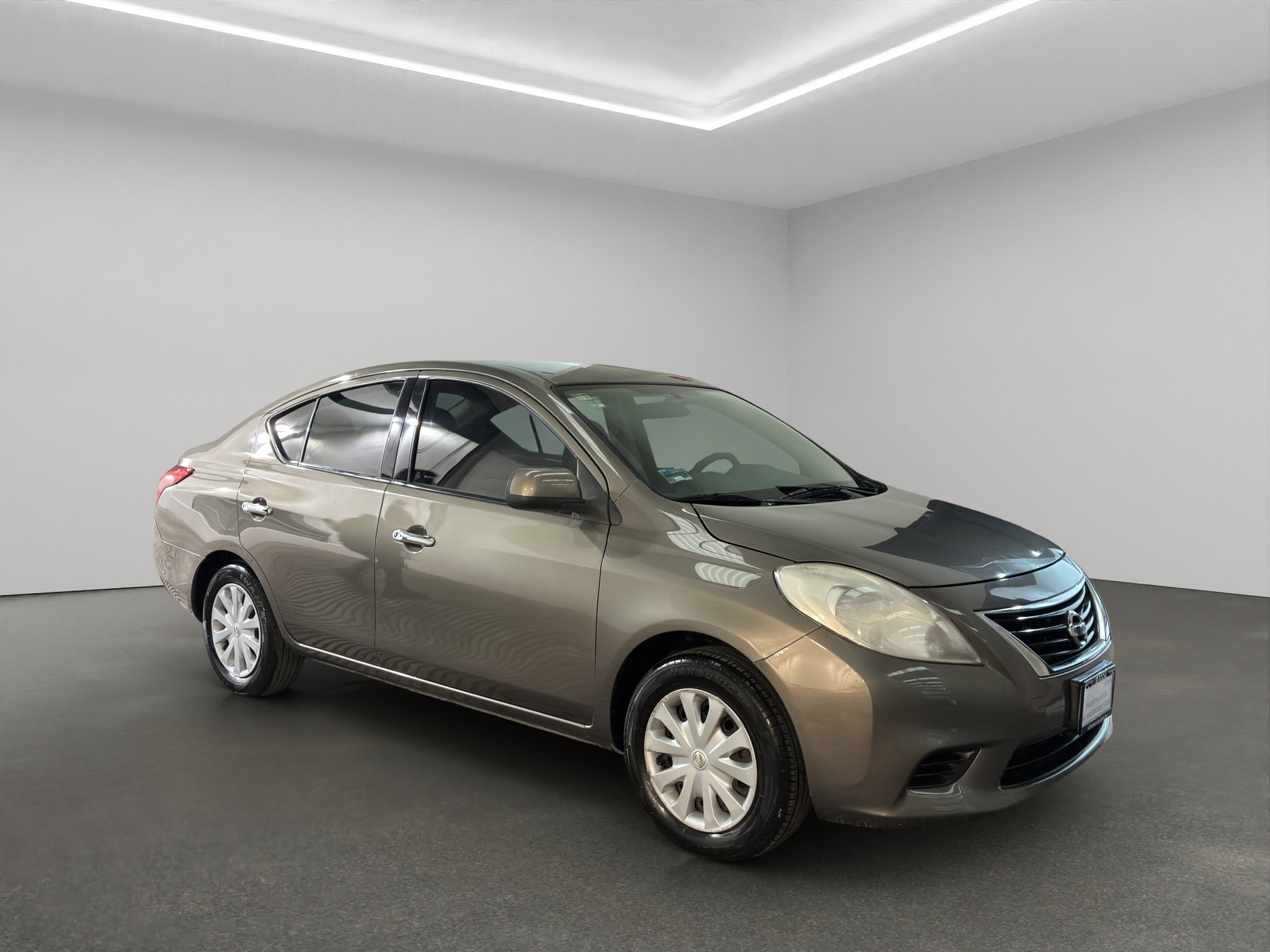 2015 Nissan Versa 4 pts. Sense, TM5, a/ac., VE