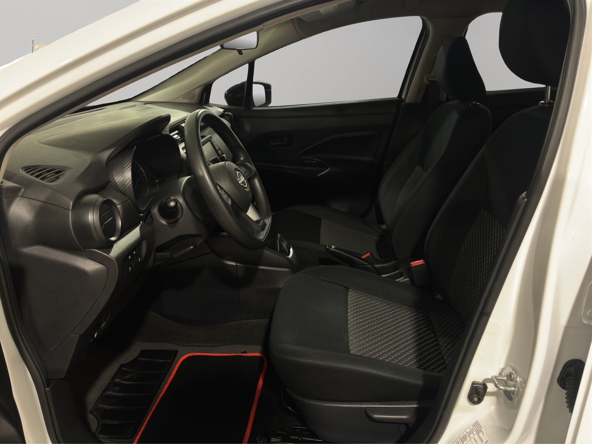 2024 Nissan Versa 4 pts. Sense, TM5, a/ac., R-15