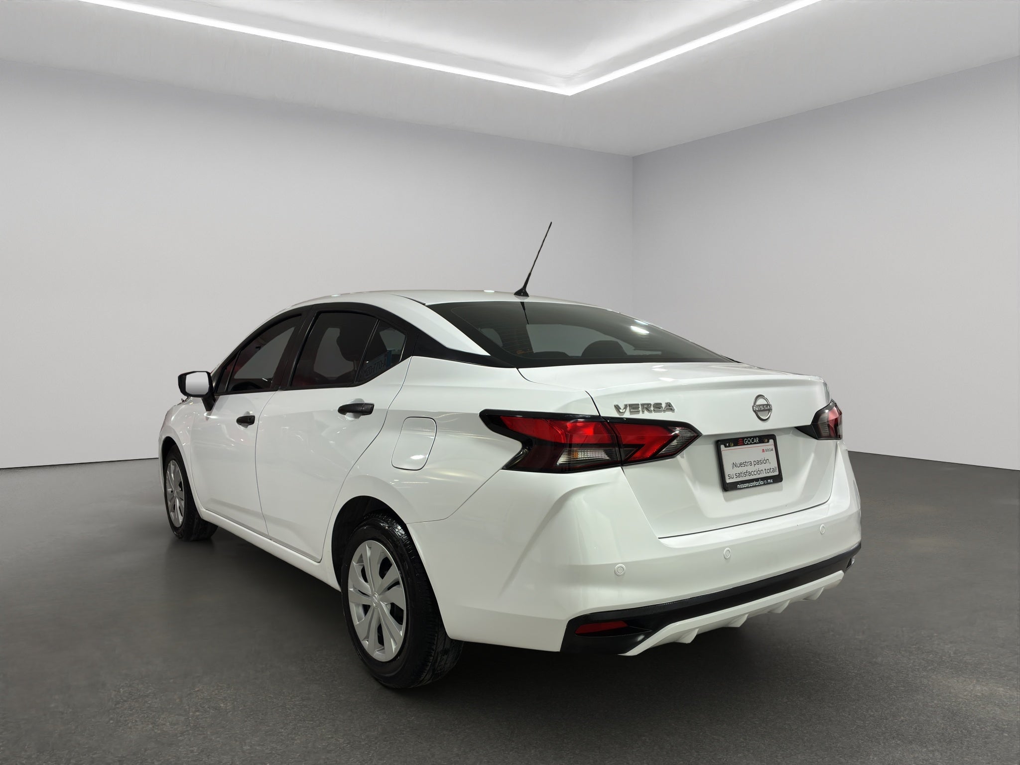 2024 Nissan Versa 4 pts. Sense, TM5, a/ac., R-15