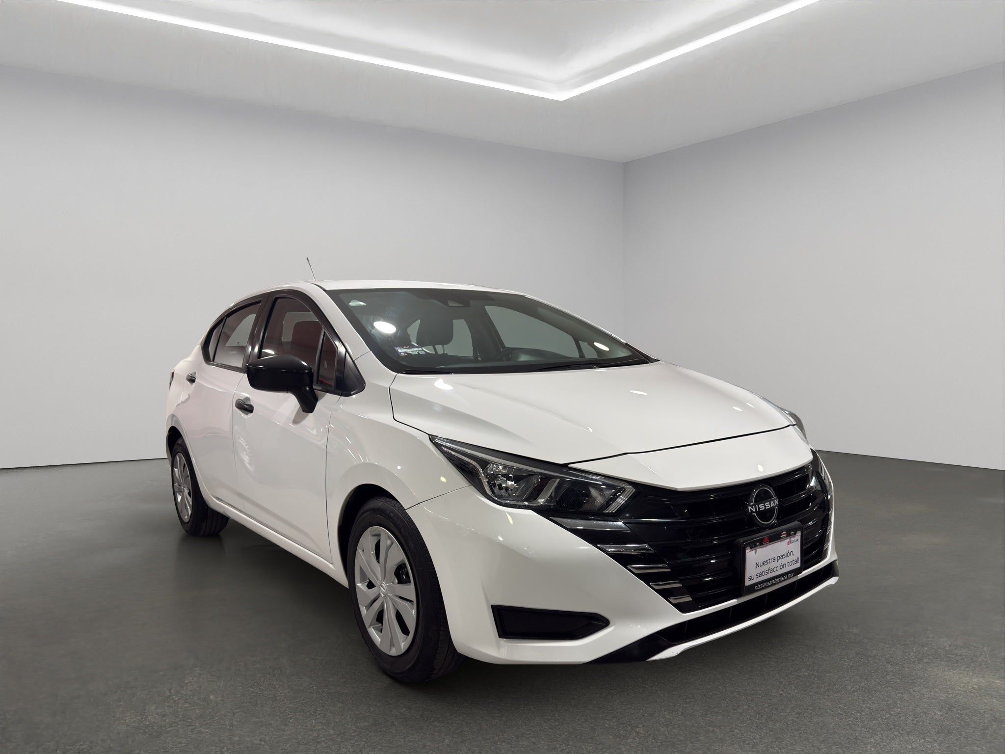 2024 Nissan Versa 4 pts. Sense, TM5, a/ac., R-15