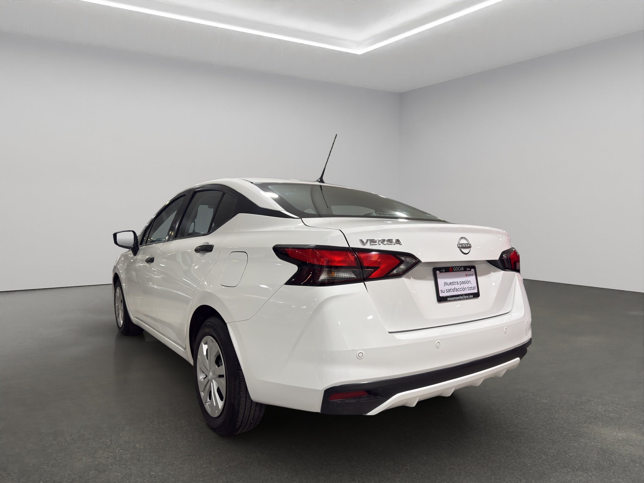 2024 Nissan Versa 4 pts. Sense, TM5, a/ac., R-15