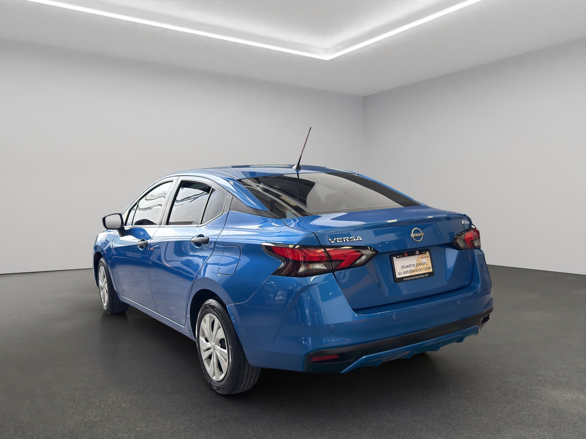 2024 Nissan Versa 4 pts. Sense, TM5, a/ac., R-15